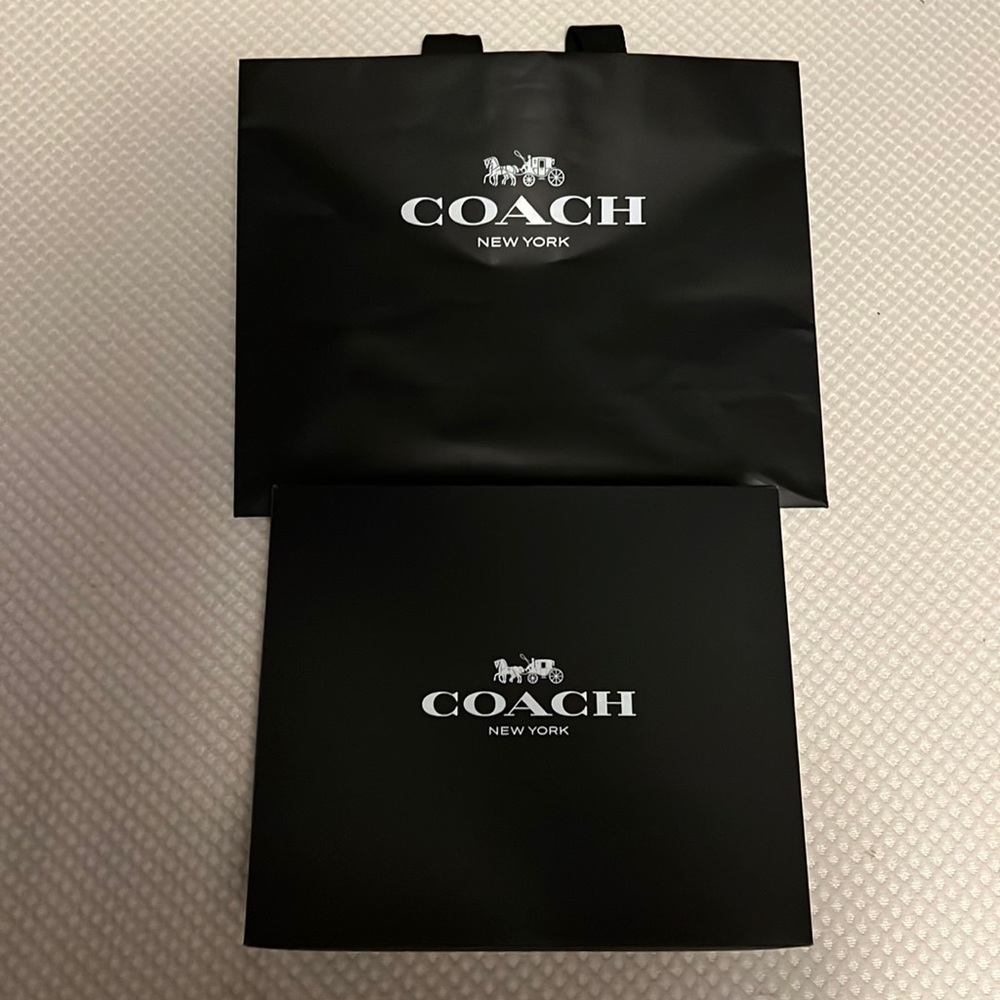 Empty coach box and coach bag